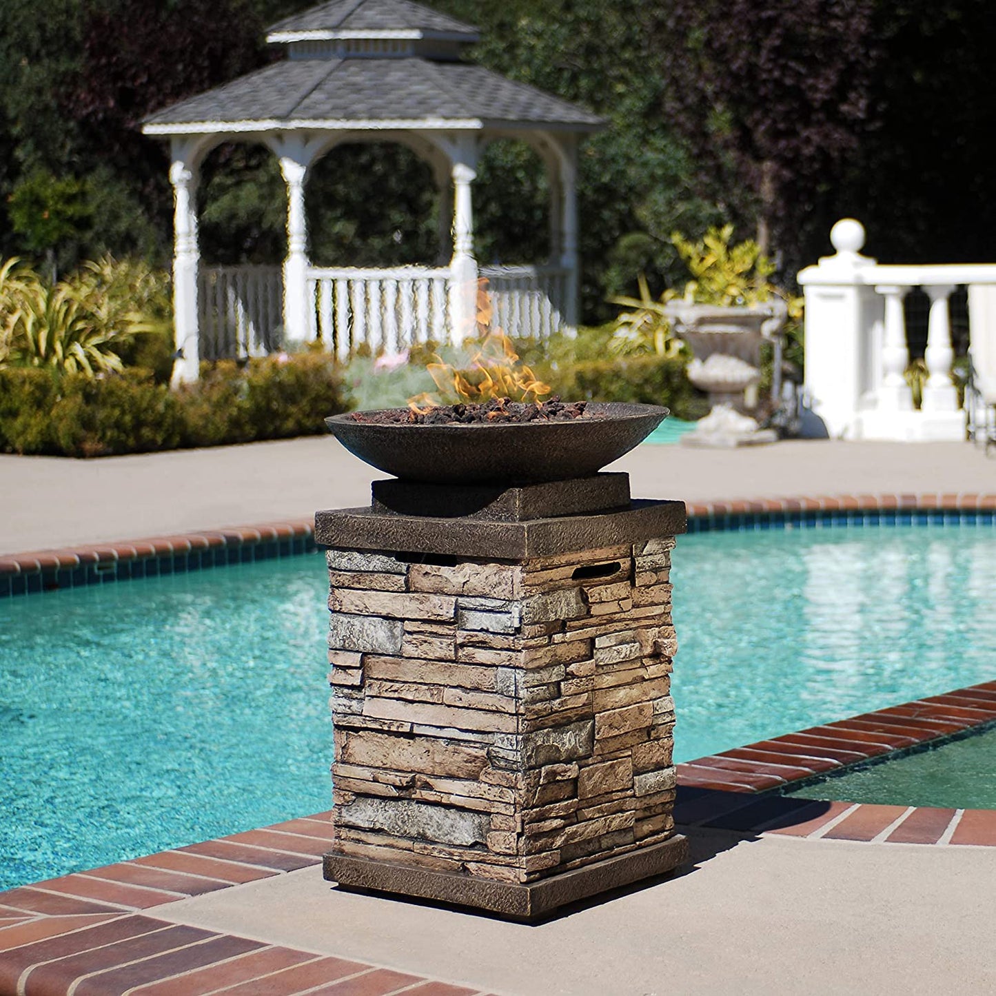 "Enhance Your Outdoor Ambiance with the Newcastle Propane Firebowl Column - Realistic Look Firepit Heater with Lava Rock, 40,000 BTU Outdoor Gas Fire Pit - Experience the Beauty of Natural Stone!"